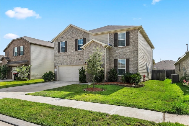 front of property featuring a garage, cooling unit, and a front yard