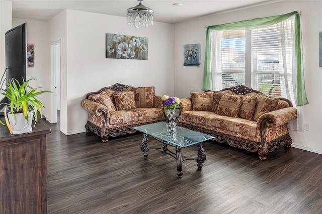 living room with dark hardwood / wood-style flooring