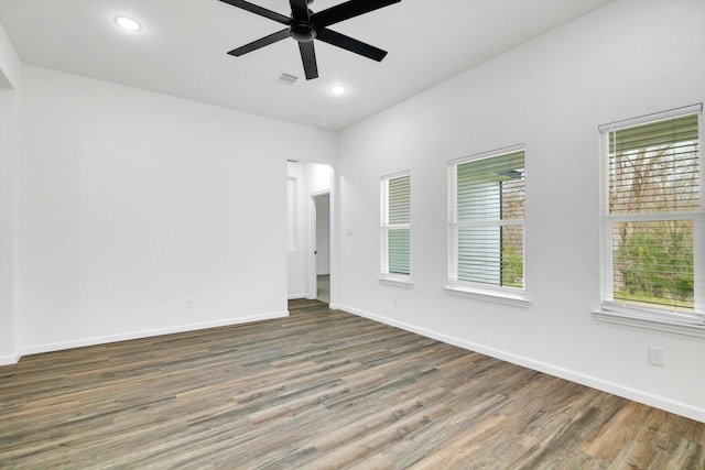 113 County Road 645, Kenefick, TX 77535 - spare room with ceiling fan and hardwood / wood-style floors