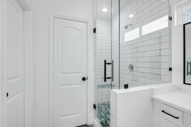 113 County Road 645, Kenefick, TX 77535 - bathroom with vanity and an enclosed shower
