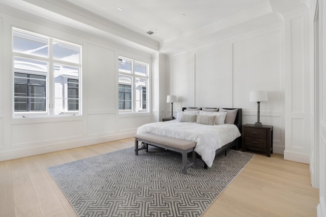 bedroom with wood-type flooring