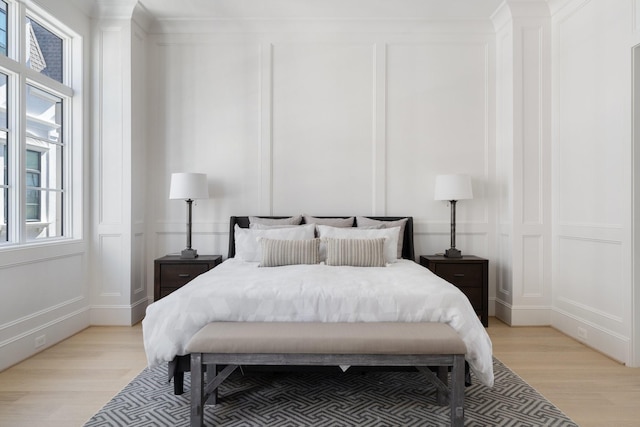 bedroom with light hardwood / wood-style floors