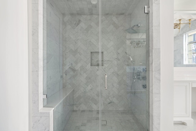 bathroom featuring an enclosed shower