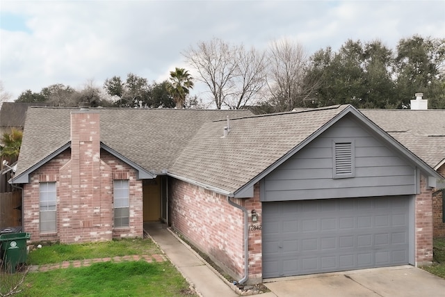 ranch-style home featuring brick siding, a shingled roof, a chimney, driveway, and an attached garage