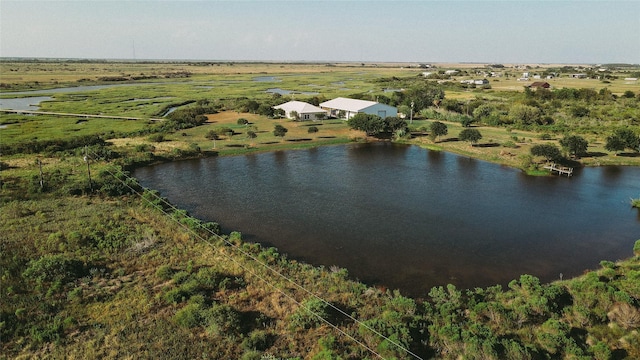 bird's eye view with a water view and a rural view