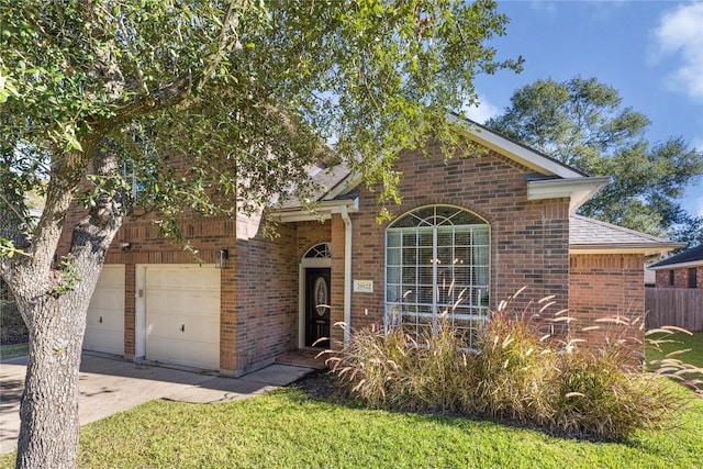 view of front of property featuring a garage