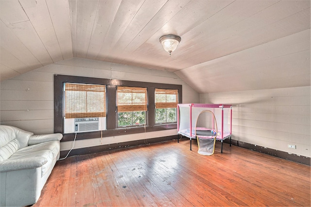 bonus room featuring cooling unit, wood ceiling, lofted ceiling, and hardwood / wood-style floors