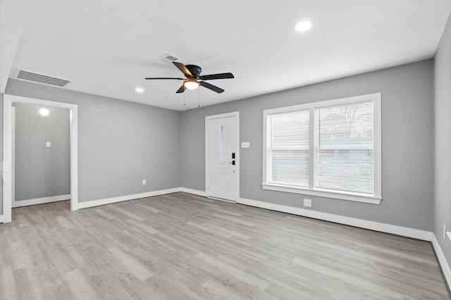 interior space with light hardwood / wood-style floors and ceiling fan