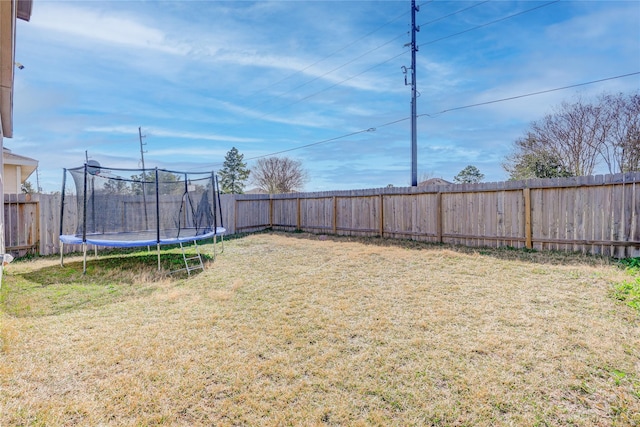 view of yard featuring a trampoline