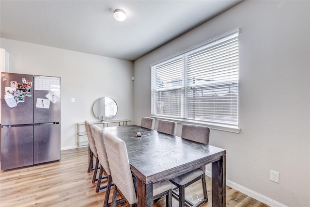 dining area featuring light hardwood / wood-style flooring