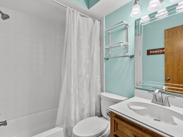 full bathroom featuring vanity, toilet, shower / tub combo, and a textured ceiling