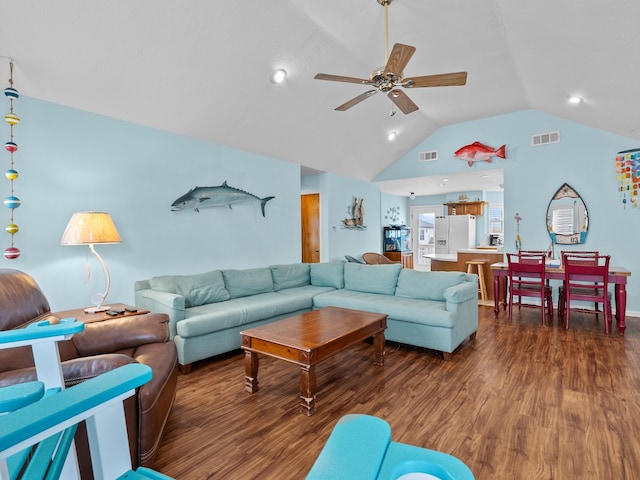 living room featuring lofted ceiling, dark wood-type flooring, and ceiling fan