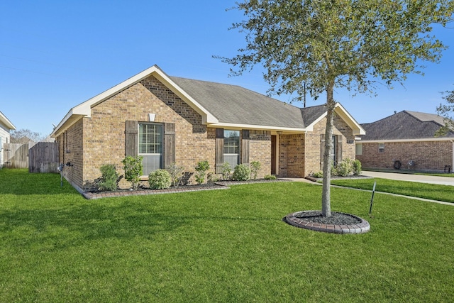 ranch-style house with a front lawn