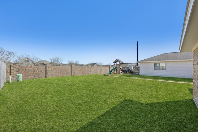 view of yard with a playground