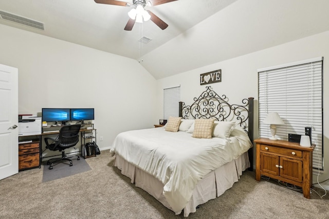 bedroom featuring lofted ceiling, light colored carpet, and ceiling fan