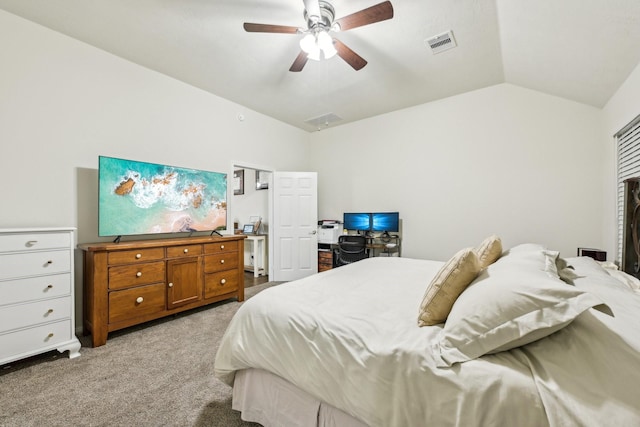 carpeted bedroom with ceiling fan and lofted ceiling