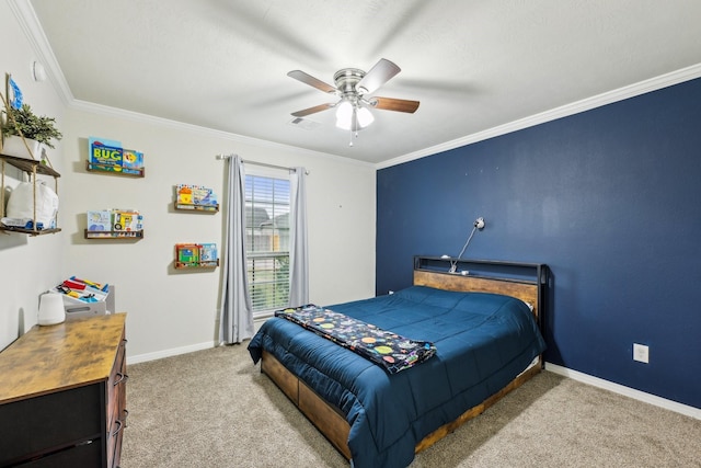 carpeted bedroom featuring crown molding and ceiling fan