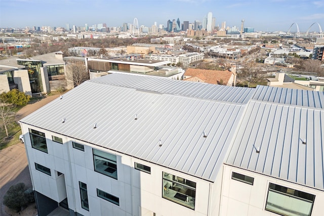 birds eye view of property with a view of city