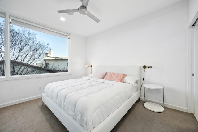 carpeted bedroom with ceiling fan, recessed lighting, and baseboards