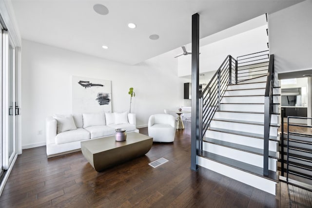 living room with dark wood-type flooring