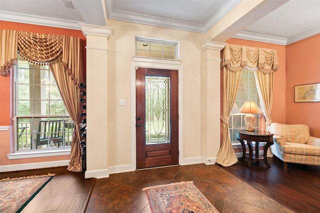 7514 Saddle Blanket Dr, Waller, TX 77484 - entryway featuring ornamental molding, ornate columns, baseboards, and wood finished floors