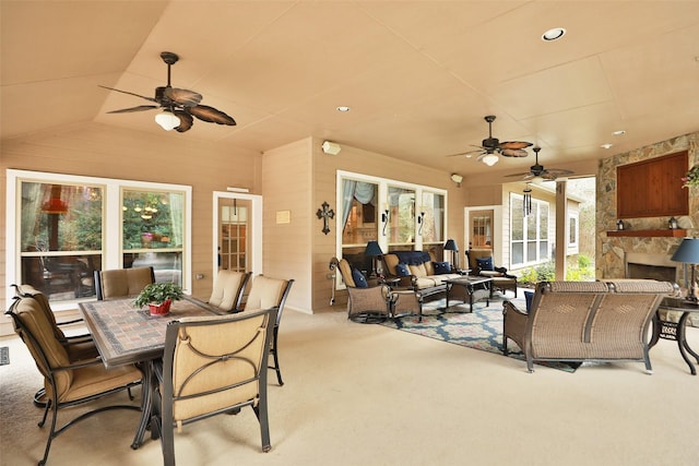 7514 Saddle Blanket Dr, Waller, TX 77484 - view of patio with a ceiling fan, an outdoor living space with a fireplace, and outdoor dining area