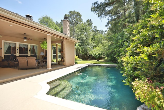 7514 Saddle Blanket Dr, Waller, TX 77484 - swimming pool featuring a ceiling fan and a patio area