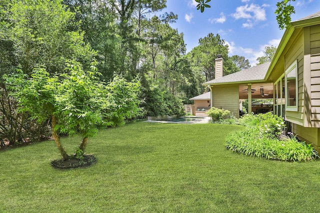 7514 Saddle Blanket Dr, Waller, TX 77484 - view of green lawn with a ceiling fan