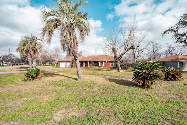 view of yard with a garage