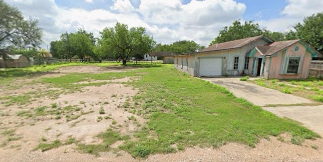 exterior space featuring a garage