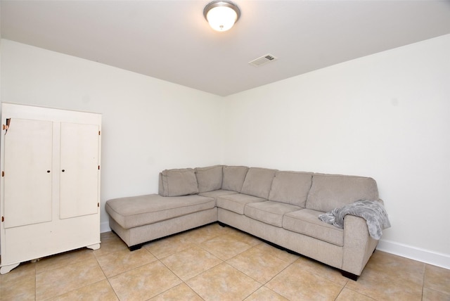 living room with light tile patterned floors