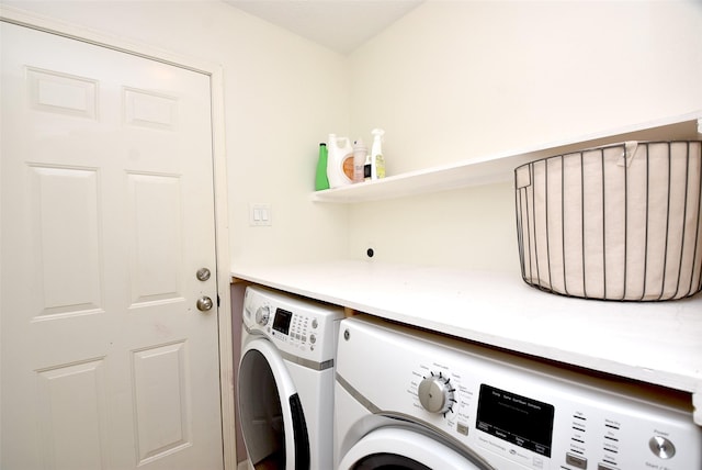 laundry room featuring separate washer and dryer