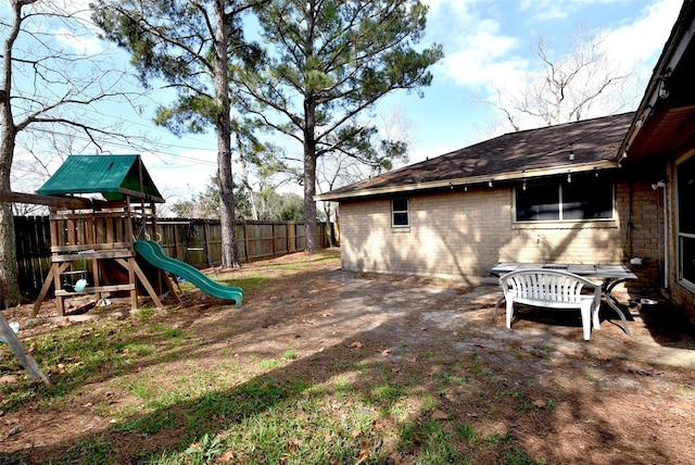 view of yard with a playground