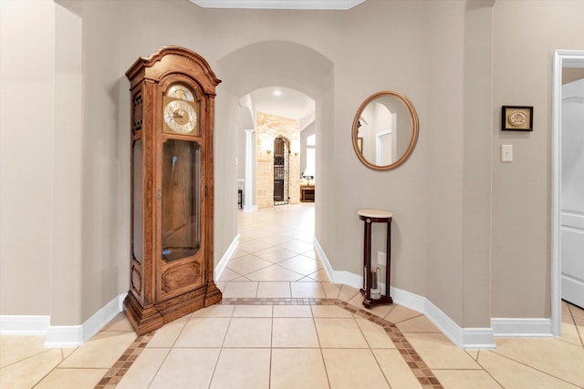 corridor featuring light tile patterned flooring