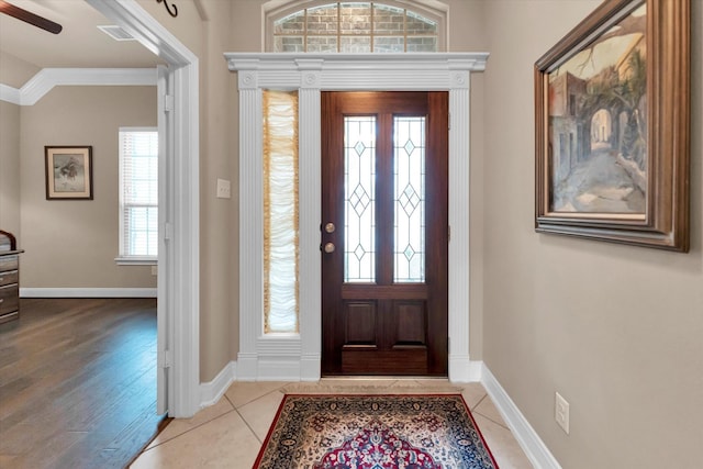 entrance foyer featuring light tile patterned floors