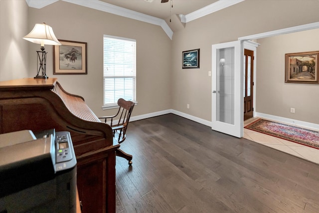 office with lofted ceiling, dark hardwood / wood-style flooring, ceiling fan, crown molding, and french doors