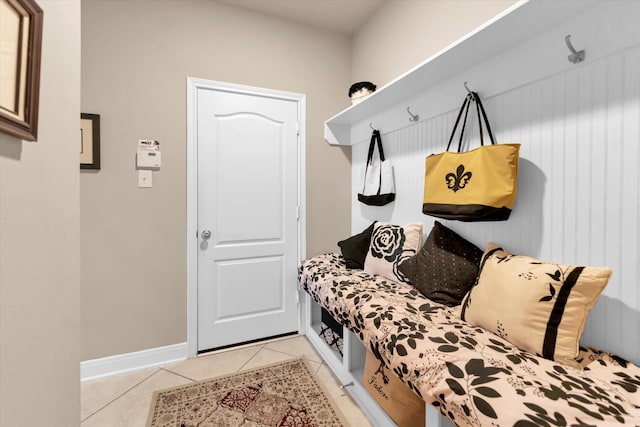 mudroom with light tile patterned flooring