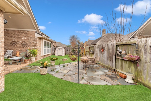 view of patio / terrace with a storage unit