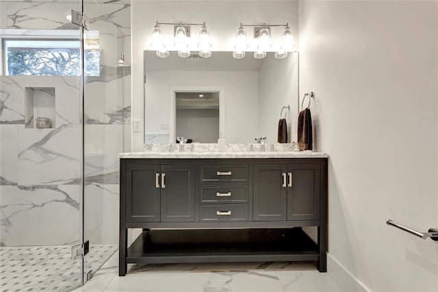 bathroom featuring vanity and an enclosed shower