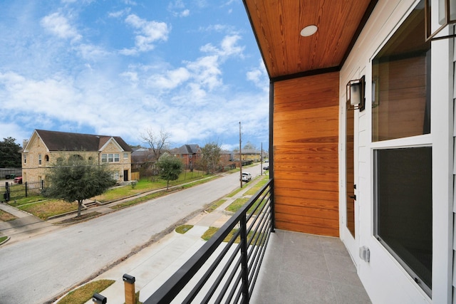 balcony featuring a residential view