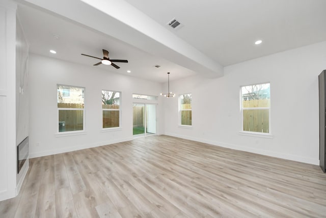 unfurnished living room featuring light wood finished floors, baseboards, visible vents, and recessed lighting