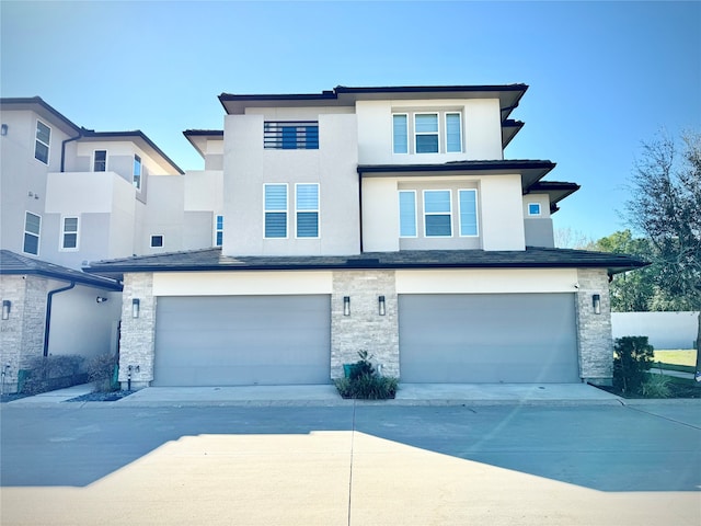 view of front of home with a garage