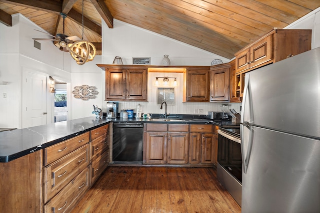 kitchen with appliances with stainless steel finishes, kitchen peninsula, sink, and wooden ceiling