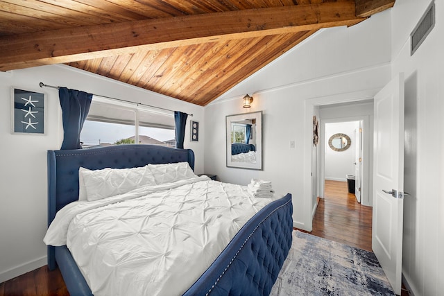 bedroom with dark hardwood / wood-style floors, vaulted ceiling with beams, and wood ceiling