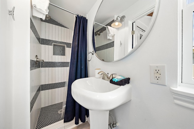 bathroom with a shower with curtain