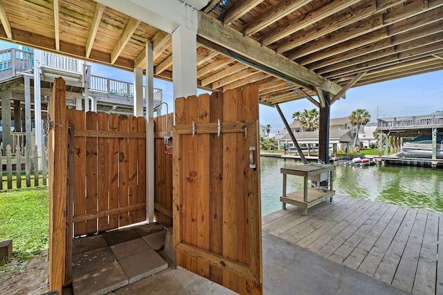 dock area with a water view