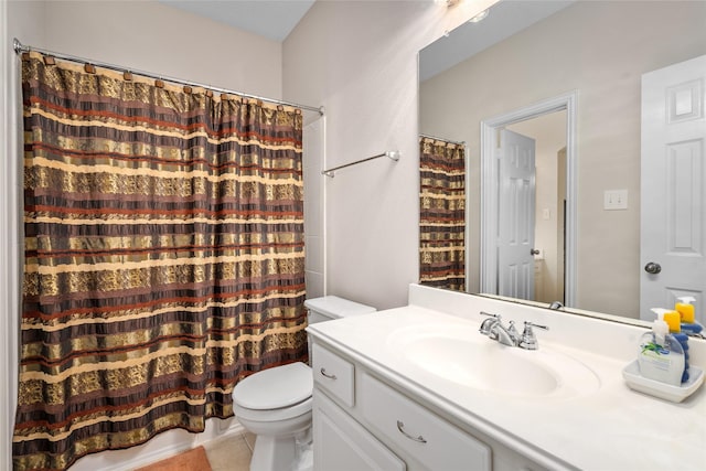 bathroom with toilet and vanity