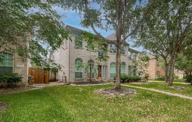 view of front of home with a front lawn