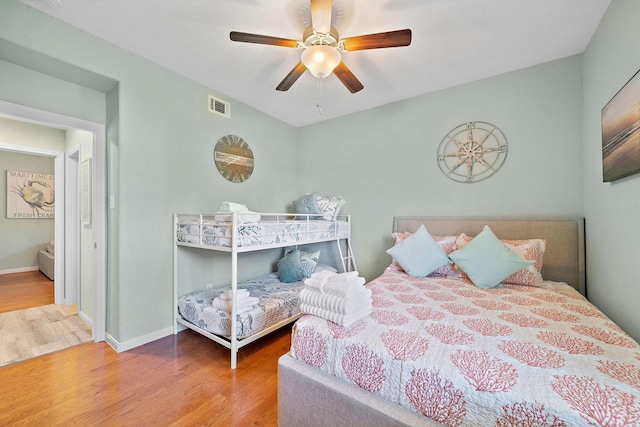 3418 Miramar Dr, Shoreacres, TX 77571 - bedroom featuring hardwood / wood-style flooring and ceiling fan