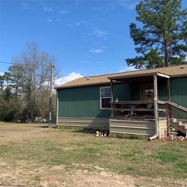 exterior space with a front lawn